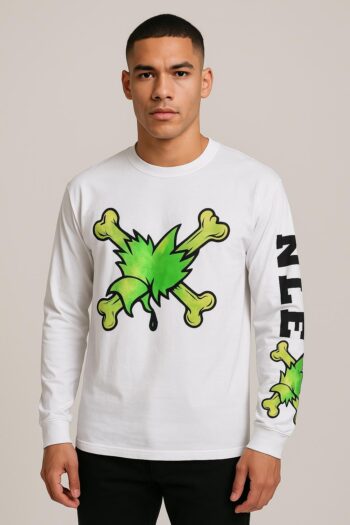 The shirt is a white long-sleeve tee with a bold green and yellow cartoon graphic on the front and “NLTE” printed on the sleeve.