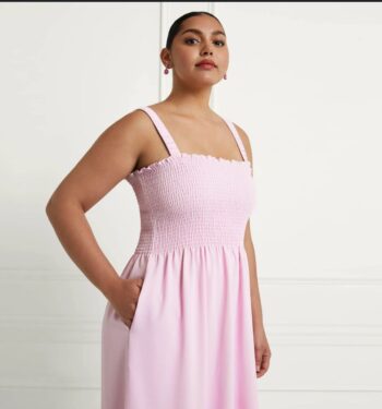 woman’s pink thin strap patterned top dress