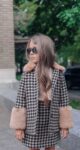 coat featuring a classic houndstooth print, faux fur collar and cuffs, front packets.