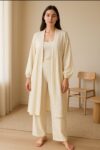 This outfit features a stylish robe paired with matching pants. The robe has a relaxed, loose fit with long sleeves that appear to have an elastic