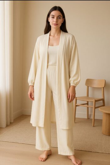 This outfit features a stylish robe paired with matching pants. The robe has a relaxed, loose fit with long sleeves that appear to have an elastic