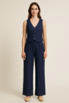 two-piece navy blue set featuring a tailored sleeveless vest with button details