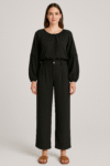 2-piece black set featuring a long-sleeve gathered neckline blouse